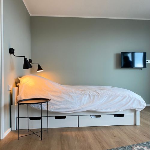 WOHN-T-RAUM Bettina Daub | Referenz-Projekt | Hamburg Eimsbüttel | Interior Design | Sanierung & Umbaumaßnahmen | Möbliertes 1-Zimmer-Appartement | Bett