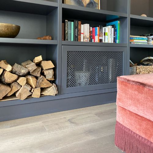 WOHN-T-RAUM Bettina Daub | Referenz-Projekt | Hamburg Alsterlauf Hummelsbüttel Poppenbüttel Sasel & Wellingsbüttel | Interior Design | Modernisierung & Renovierung | Kaminzimmer mit Bibliothek | Pouf
